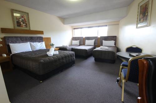 Imagen de la habitación del Hotel Molly Morgan Motor Inn. Foto 5