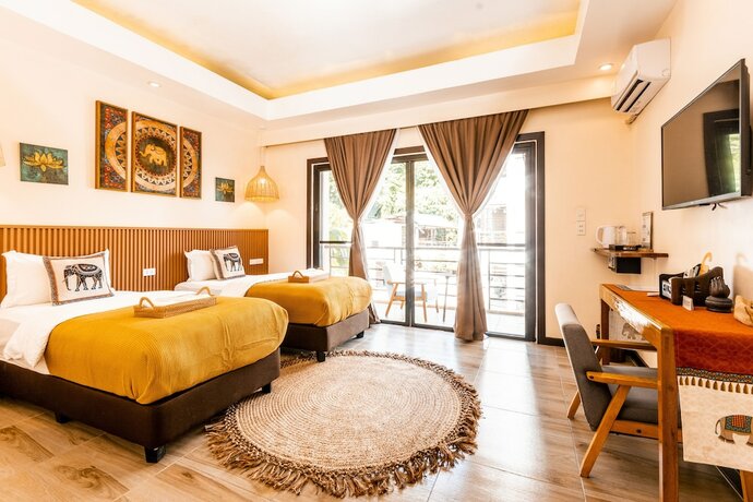 Imagen de la habitación del Hotel Molly Resort. Foto 15