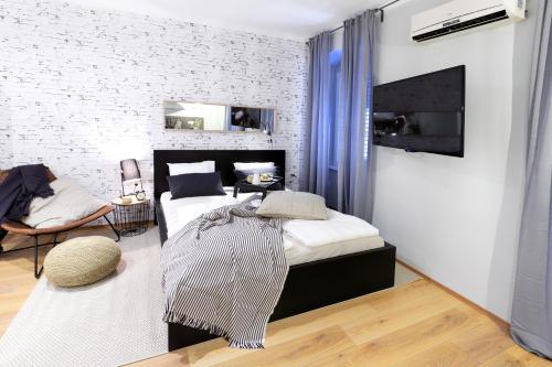 Imagen de la habitación del Hotel Molo Longo - Central Apartments & Rooms. Foto 16