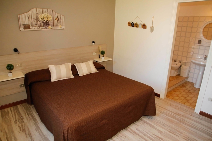 Imagen de la habitación del Hotel Mom Assisi, Santa Maria Degli Angeli. Foto 4