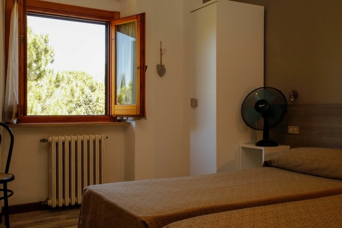 Imagen de la habitación del Hotel Mom Assisi, Santa Maria Degli Angeli. Foto 8