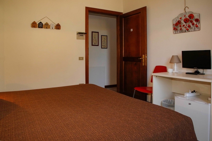 Imagen de la habitación del Hotel Mom Assisi, Santa Maria Degli Angeli. Foto 12