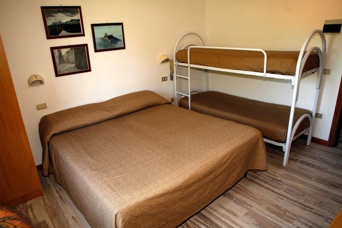 Imagen de la habitación del Hotel Mom Assisi, Santa Maria Degli Angeli. Foto 15