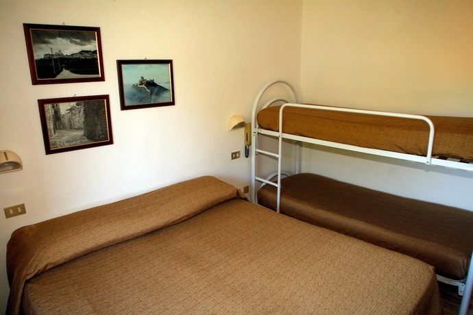 Imagen de la habitación del Hotel Mom Assisi, Santa Maria Degli Angeli. Foto 16