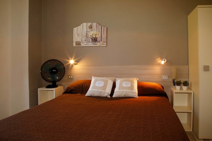 Imagen de la habitación del Hotel Mom Assisi, Santa Maria Degli Angeli. Foto 18