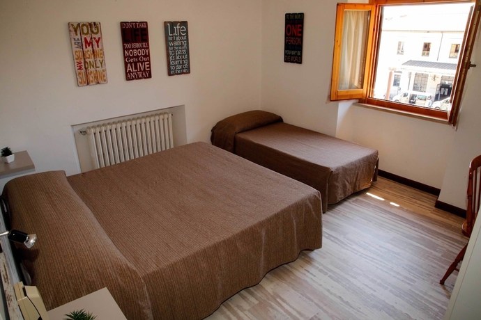 Imagen de la habitación del Hotel Mom Assisi, Santa Maria Degli Angeli. Foto 19