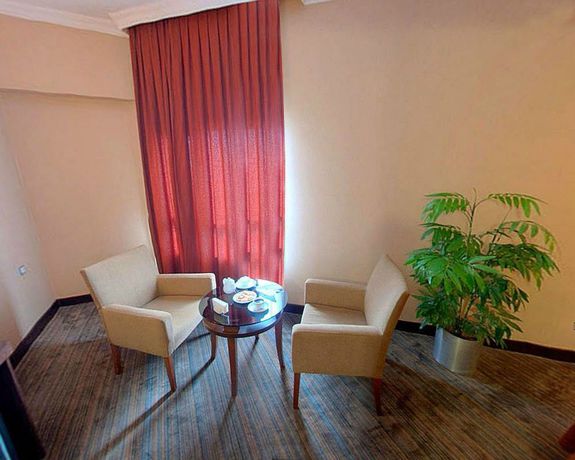 Imagen de la habitación del Hotel Mom. Foto 10