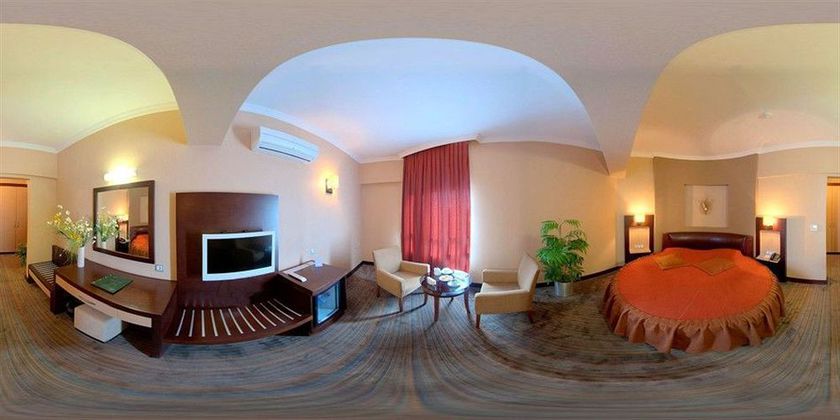 Imagen de la habitación del Hotel Mom. Foto 11