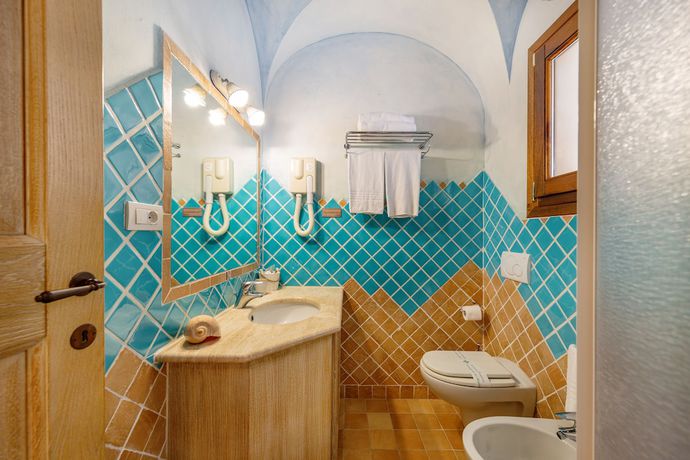 Imagen de la habitación del Hotel Moma Hotel Cannigione. Foto 3