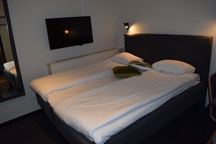 Imagen de la habitación del Hotel Moment Hotels. Foto 5