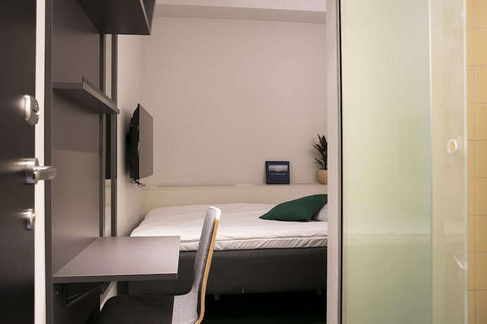 Imagen de la habitación del Hotel Moment Hotels. Foto 9