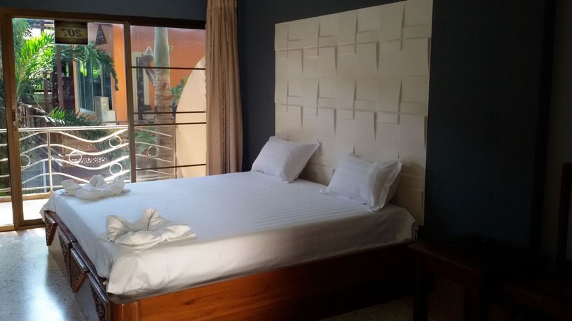 Imagen de la habitación del Hotel Momento Resort. Foto 7
