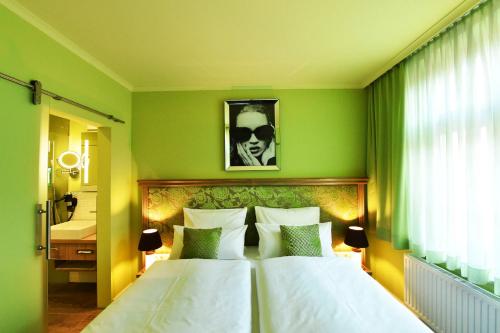 Imagen de la habitación del Hotel Moments Boutique. Foto 6