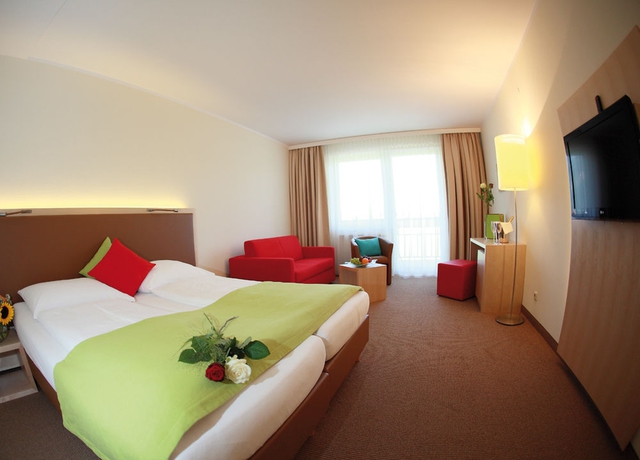 Imagen de la habitación del Hotel Momentum. Foto 7