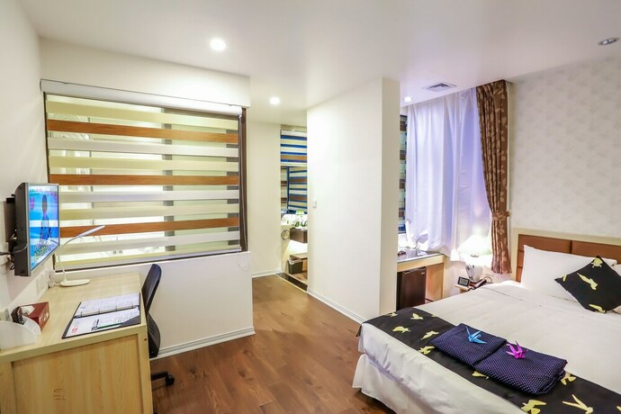 Imagen de la habitación del Hotel Momizi Business. Foto 15