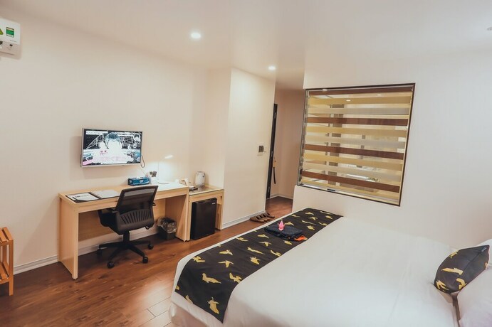Imagen de la habitación del Hotel Momizi Business. Foto 16