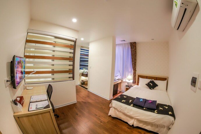 Imagen de la habitación del Hotel Momizi Business. Foto 22