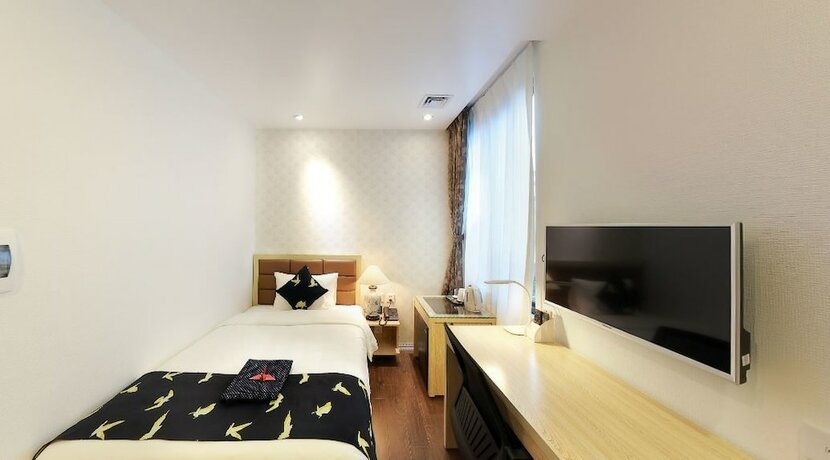 Imagen de la habitación del Hotel Momizi Business. Foto 25