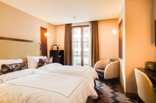 Imagen de la habitación del Hotel Mom’art. Foto 5