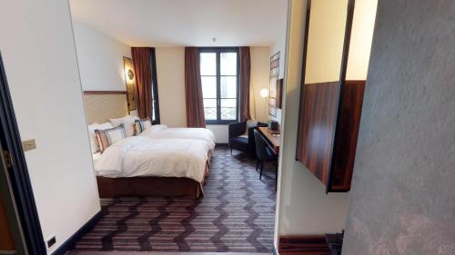 Imagen de la habitación del Hotel Mom’art. Foto 6