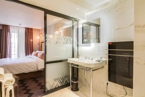 Imagen de la habitación del Hotel Mom’art. Foto 7