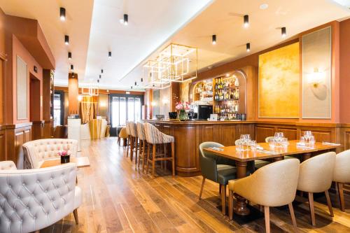 Imagen del bar/restaurante del Hotel Mom’art. Foto 4