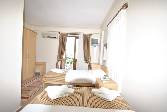 Imagen de la habitación del Hotel Moms. Foto 2
