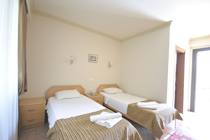Imagen de la habitación del Hotel Moms. Foto 11