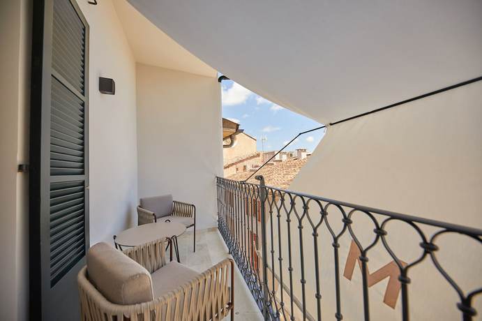 Imagen de la habitación del Hotel Mon Boutique. Foto 13