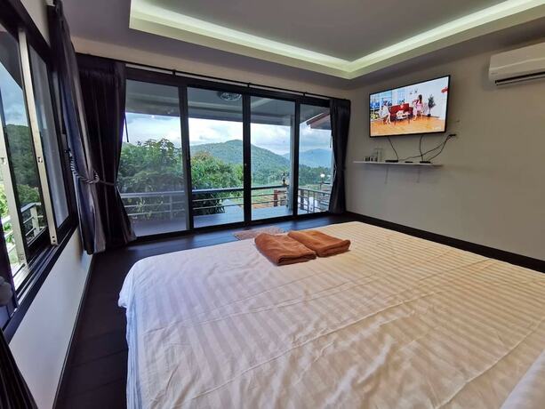 Imagen de la habitación del Hotel Mon Ing Dao. Foto 17