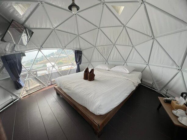 Imagen de la habitación del Hotel Mon Ing Dao. Foto 19