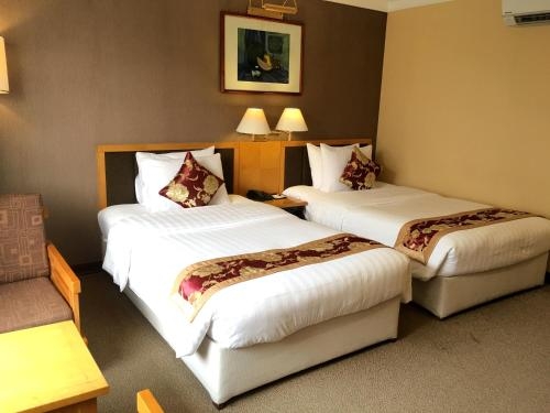 Imagen de la habitación del Hotel Mon Regency. Foto 6