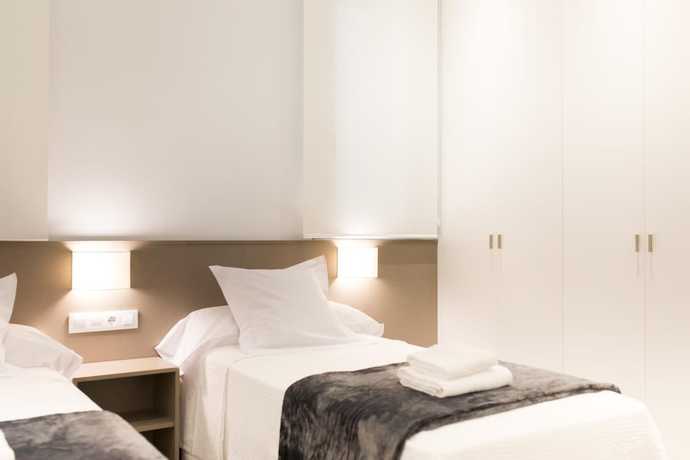 Imagen de la habitación del Hotel Mon Suites San Martín. Foto 8