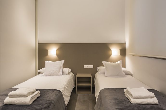 Imagen de la habitación del Hotel Mon Suites San Martín. Foto 10