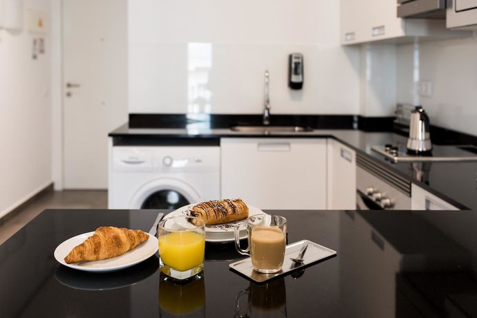 Imagen de la habitación del Hotel Mon Suites San Martín. Foto 11