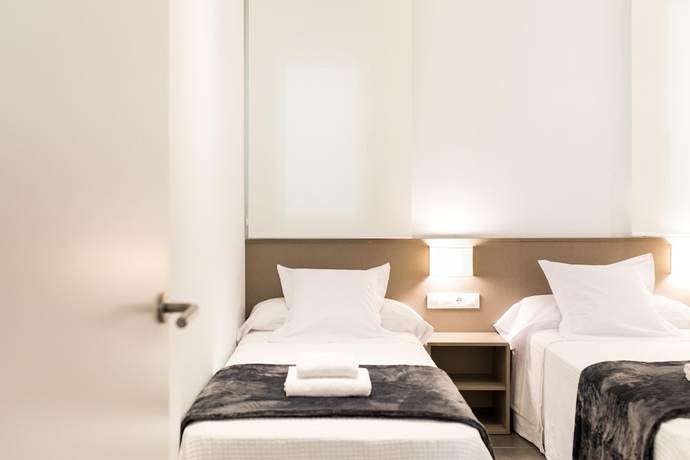 Imagen de la habitación del Hotel Mon Suites San Martín. Foto 16