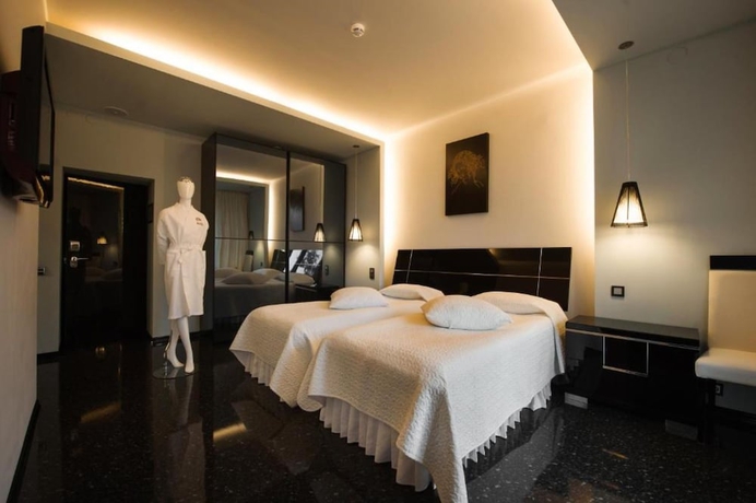 Imagen de la habitación del Hotel Mona Boutique. Foto 2