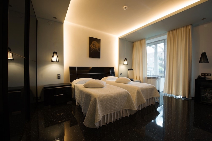 Imagen de la habitación del Hotel Mona Boutique. Foto 3