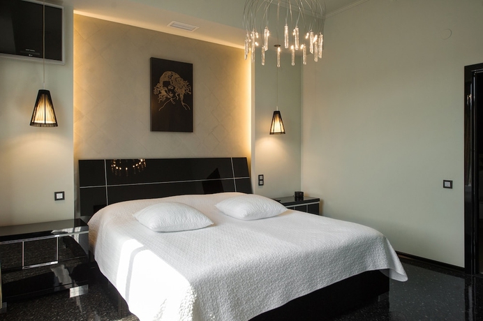 Imagen de la habitación del Hotel Mona Boutique. Foto 4