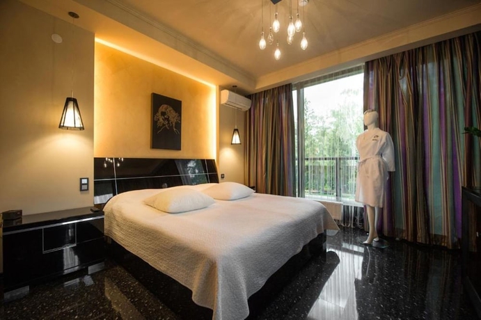 Imagen de la habitación del Hotel Mona Boutique. Foto 6