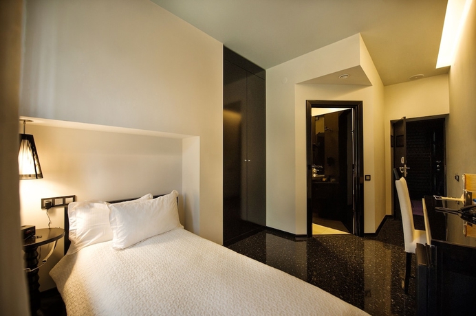 Imagen de la habitación del Hotel Mona Boutique. Foto 8