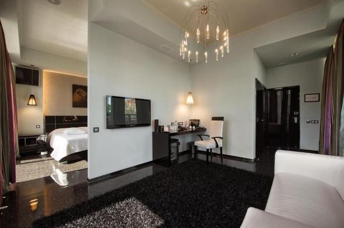 Imagen de la habitación del Hotel Mona Boutique. Foto 11