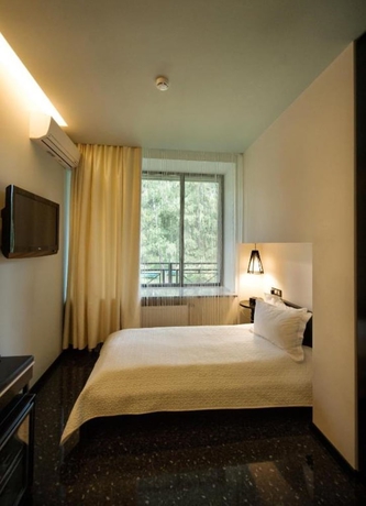 Imagen de la habitación del Hotel Mona Boutique. Foto 12