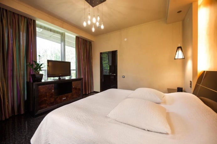 Imagen de la habitación del Hotel Mona Boutique. Foto 15