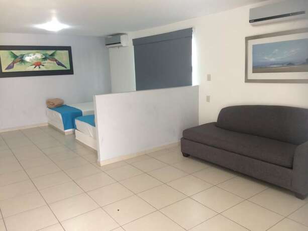 Imagen de la habitación del Hotel Mona Inn. Foto 19