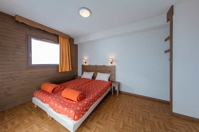 Imagen de la habitación del Hotel Mona Lisa L'ecrin Des Neiges. Foto 11