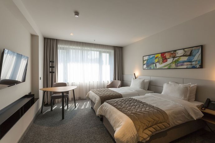 Imagen de la habitación del Hotel Mona Plaza. Foto 6