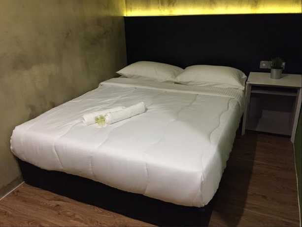 Imagen de la habitación del Hotel Monaco Boutique Kampung Air. Foto 5