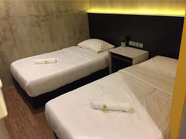 Imagen de la habitación del Hotel Monaco Boutique Kampung Air. Foto 8