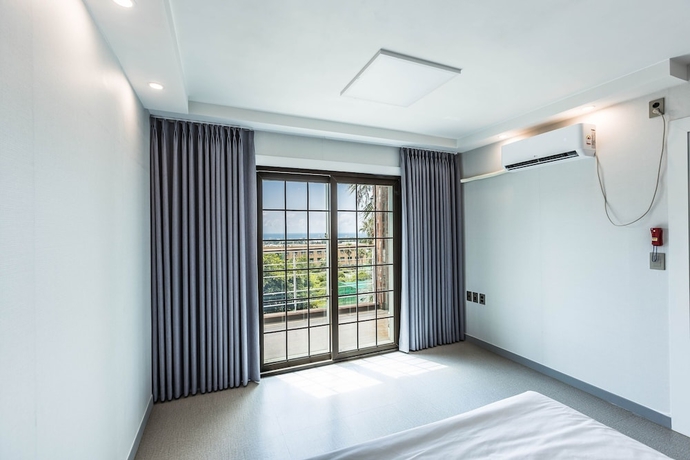 Imagen de la habitación del Hotel Monaco Pool Pension. Foto 15